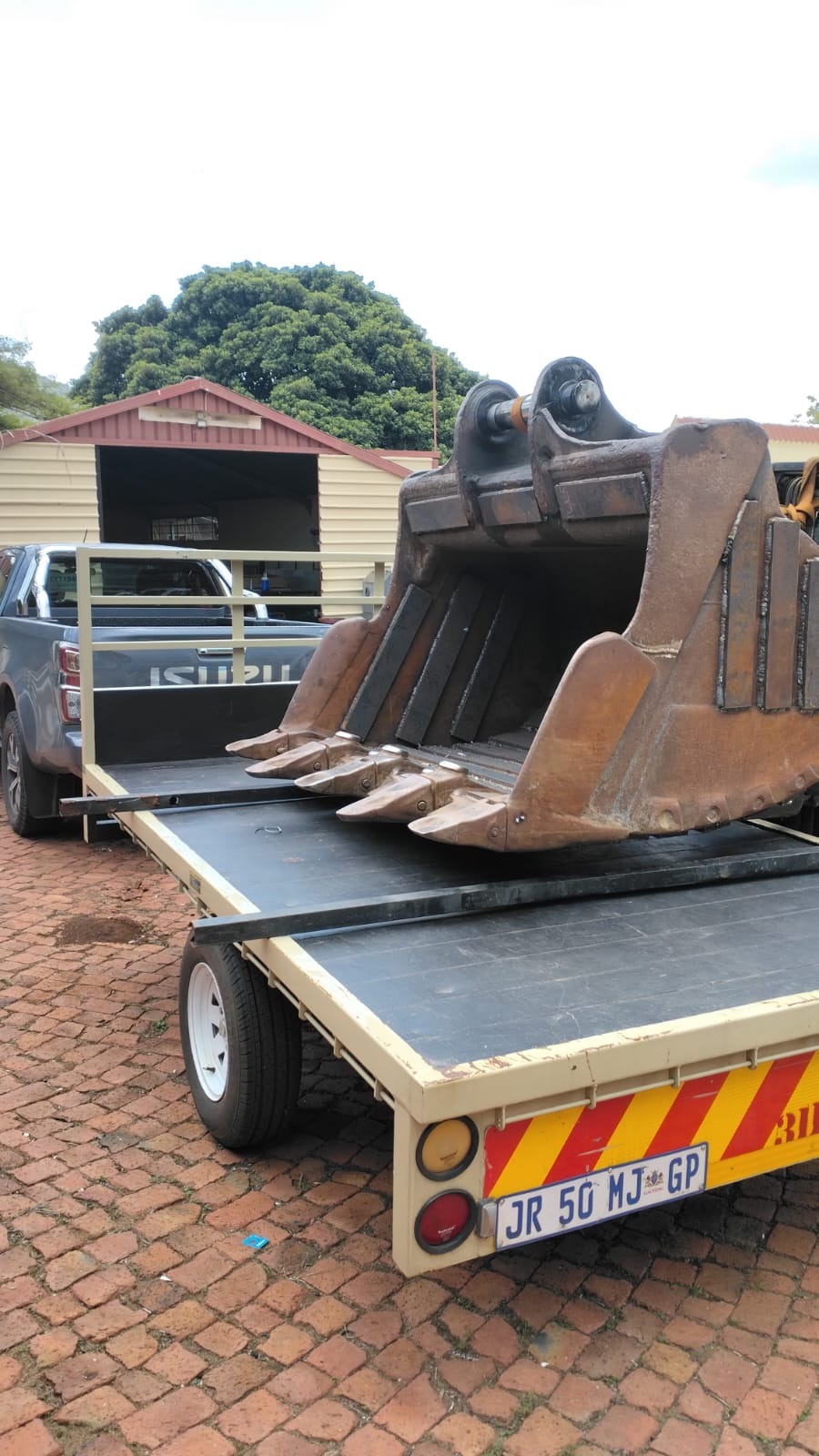 Repaired excavator bucket loaded for delivery