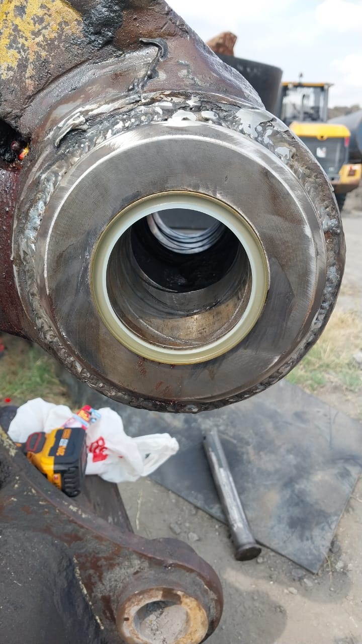 Welded cylinder eye with new bush installed